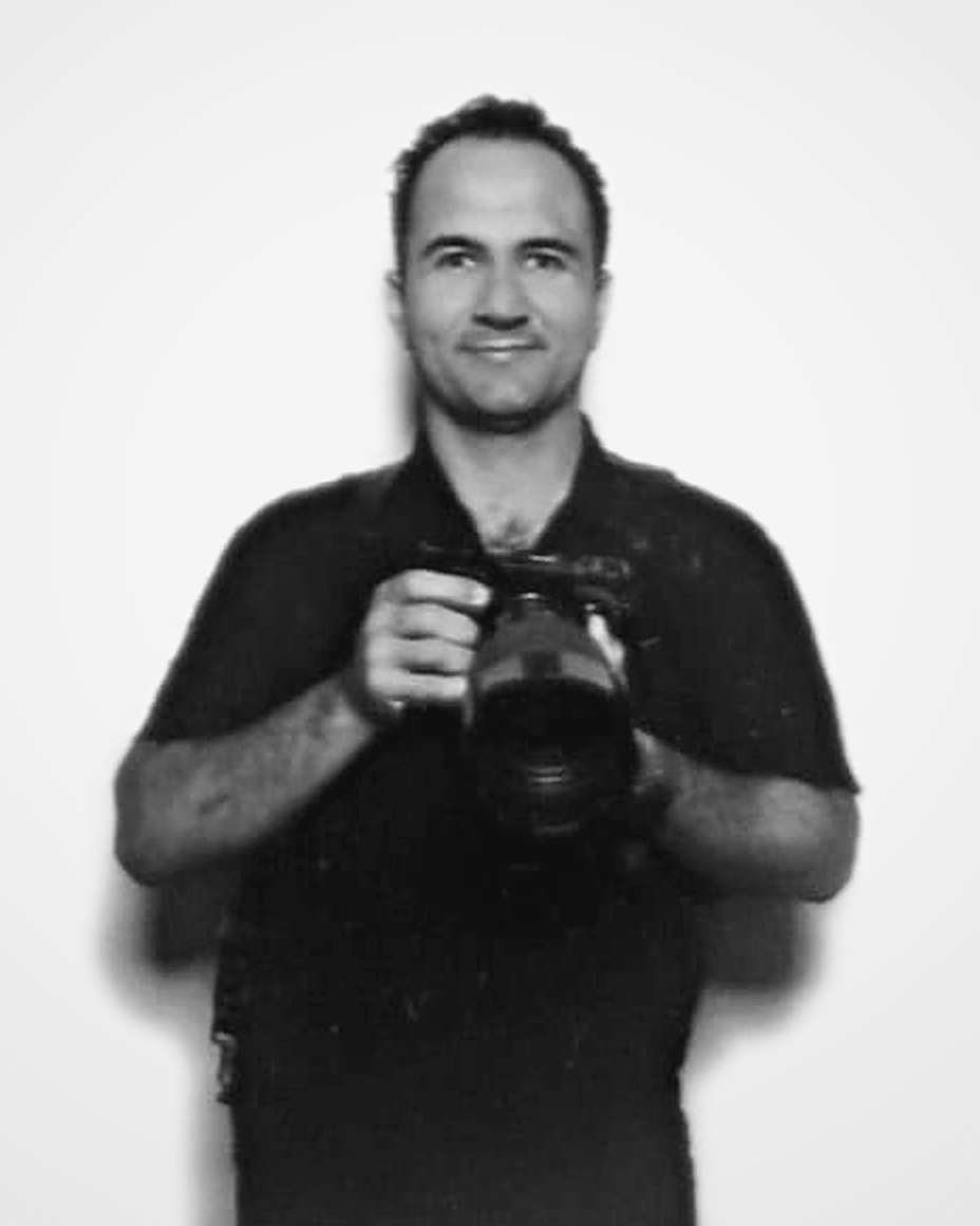 Eugenio Salcedo holding his camera