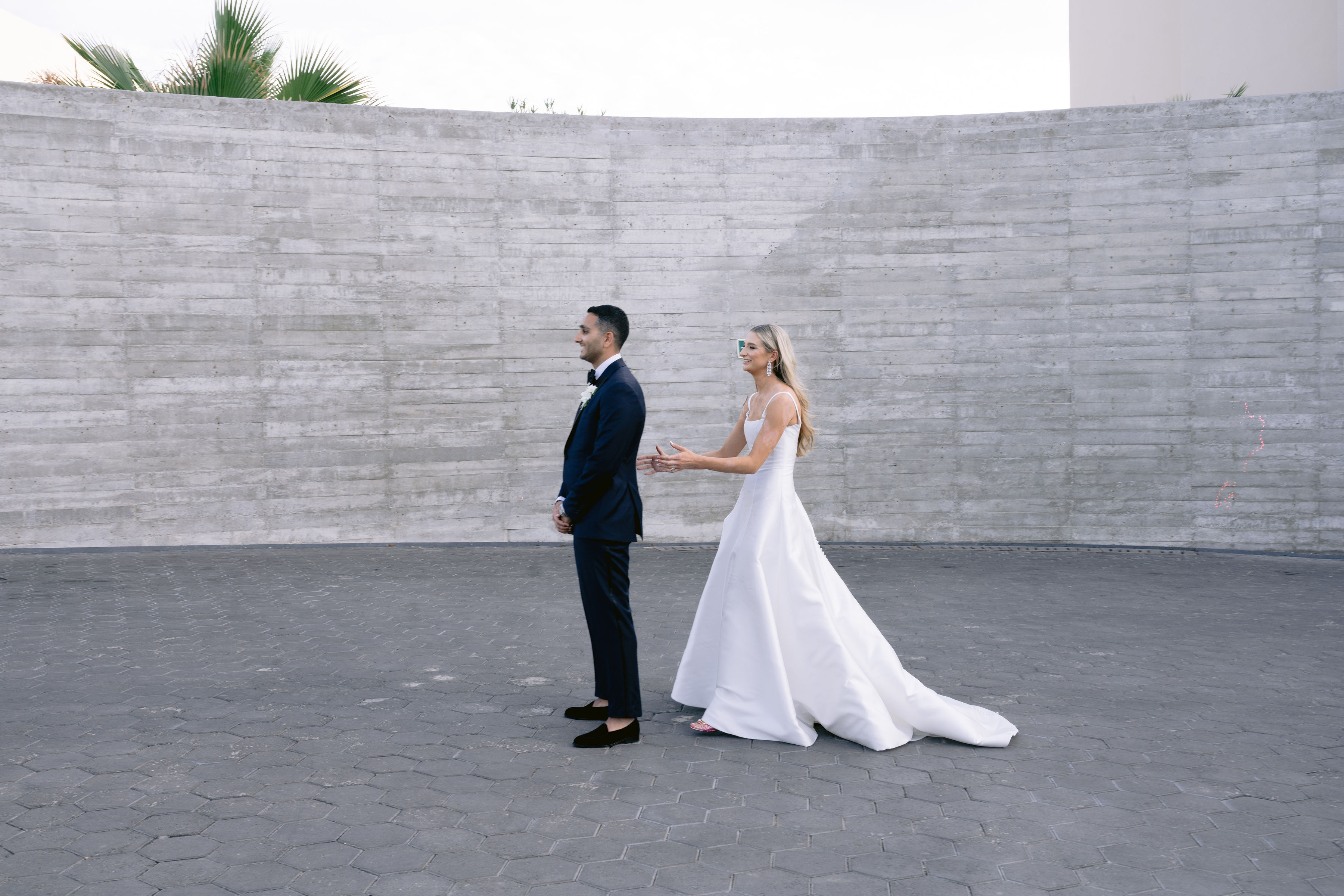 First look between bride and groom in Los Cabos