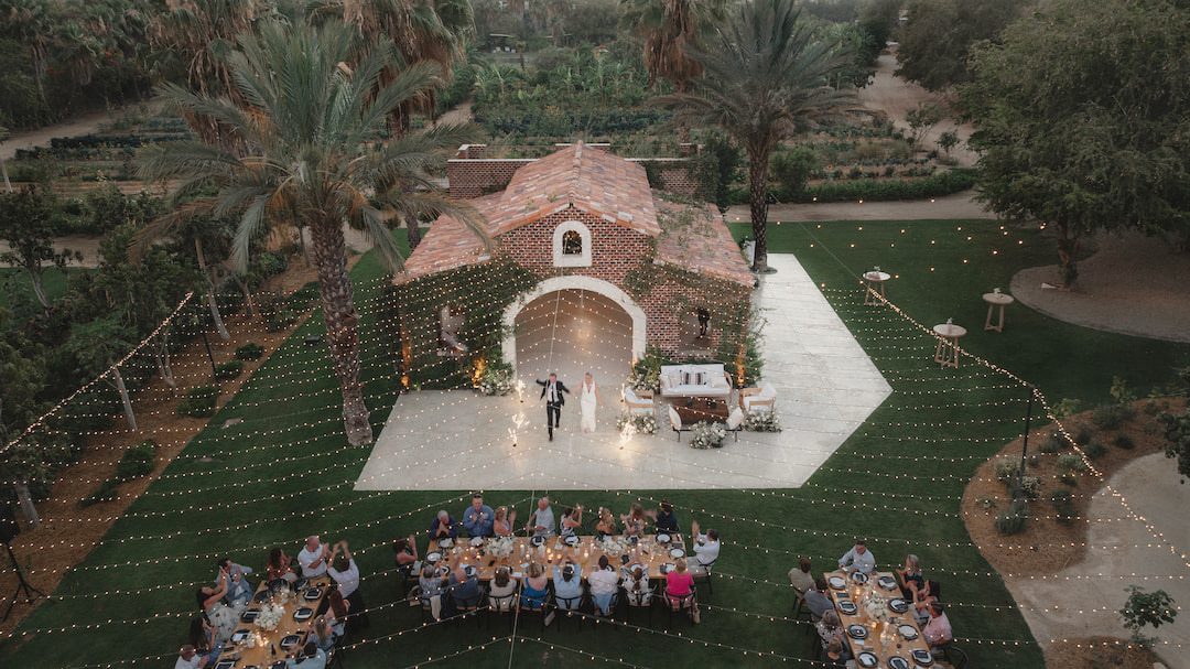 Aerial view of a chapel and garden dinner