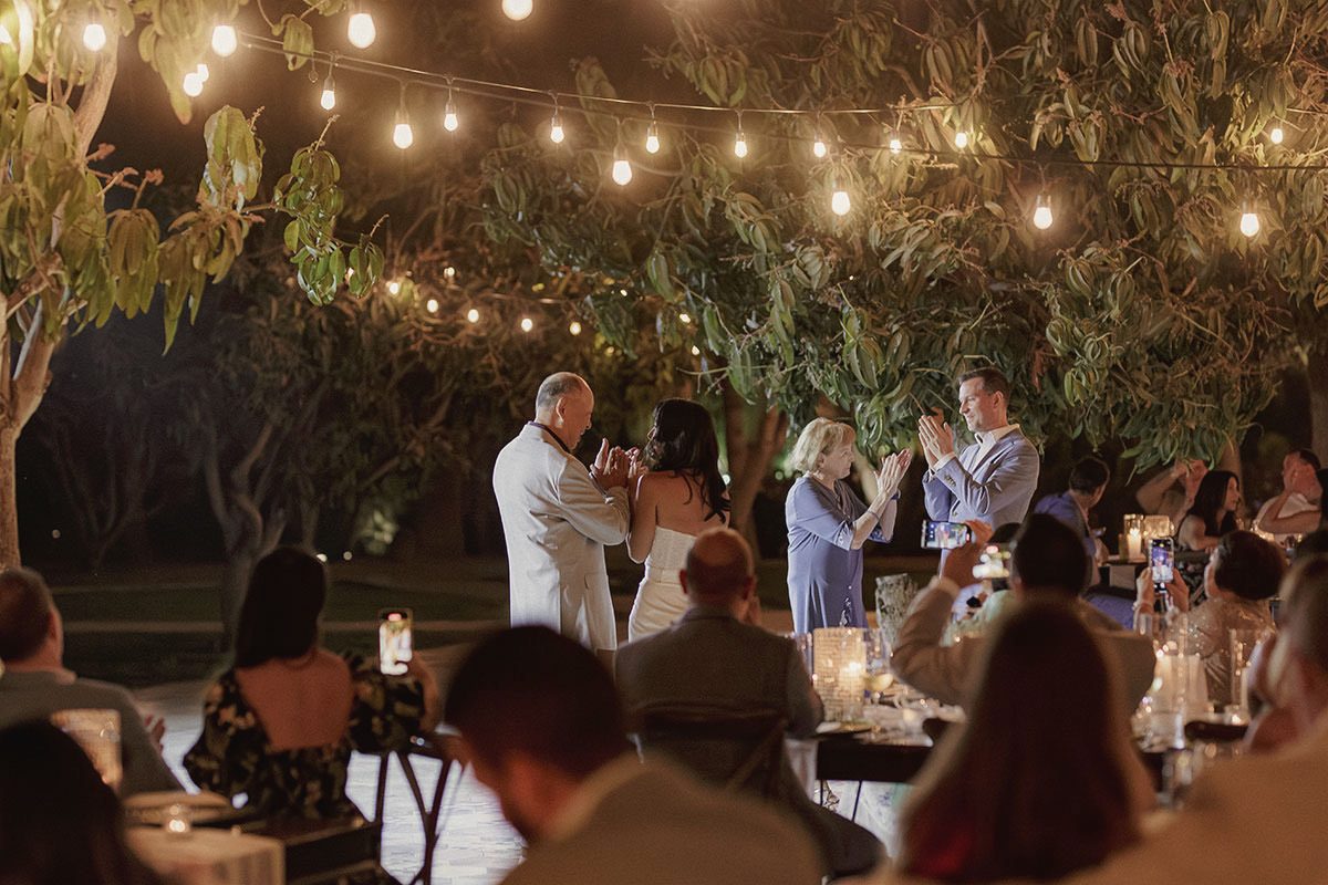 Candlelit garden ceremony at night